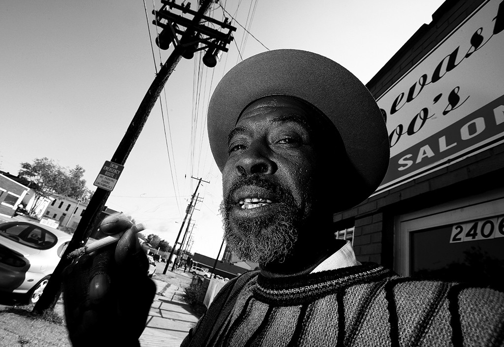 FIRST PLACE: Mark Samala , California State University - Fullerton — Esmond Davis, 62, waits outside of a salon and barbershop in the Portland area of Louisville, Ky, Friday, Oct. 29, 2010. Davis routinely visits his group of friends on Market Dr. and 29th Ave every morning prior to going to his shift in a factory.